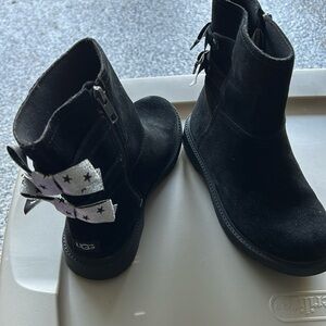 Like new girls Ugg suede boots with zip up sides and bows in the back